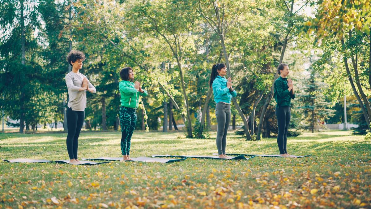 OFS outdoor fitness systems training session on forest trail with resistance bands and bodyweight exercises